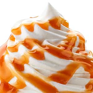 Caramel sauce on whipped cream.